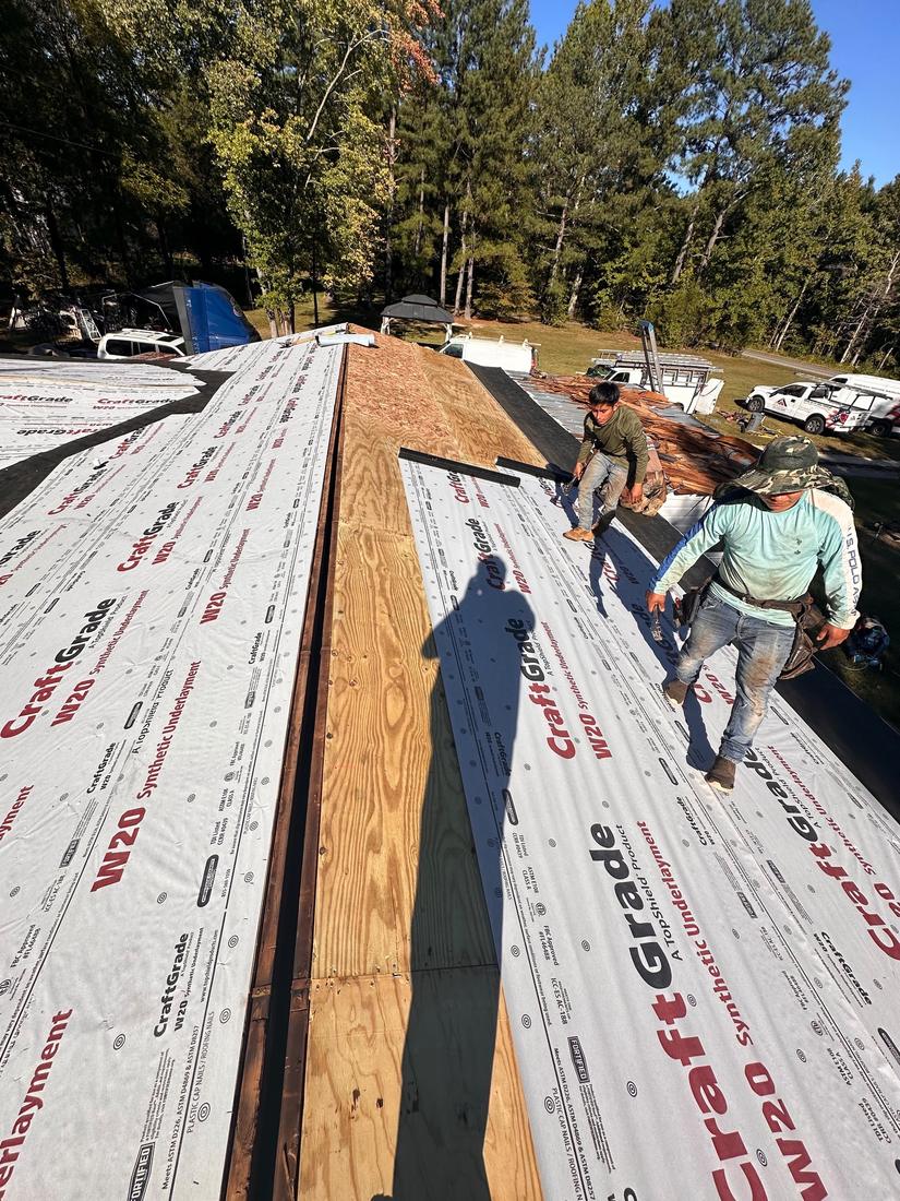 Synthetic underlayment going down